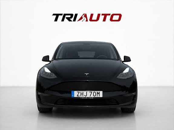 Tesla Model Y 2 of 5