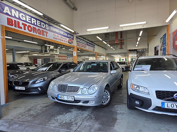 Mercedes-Benz E240 2 of 14