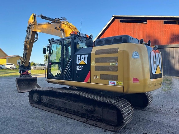 Caterpillar 326 F L rototillt med grip 3 of 5