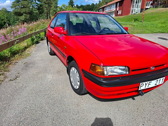 Mazda 323 4 of 6