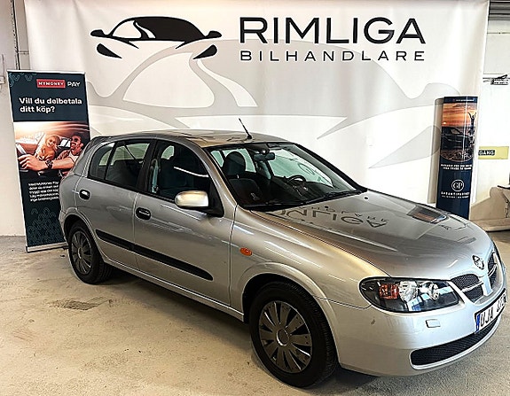 Nissan Almera 2 of 7
