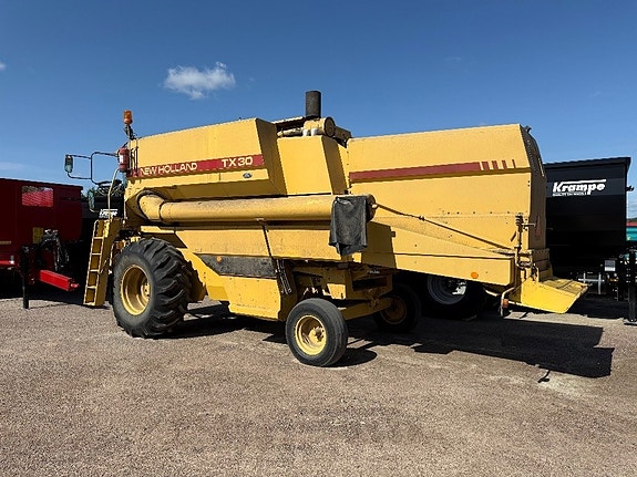 New Holland TX 30 15” 2 of 4