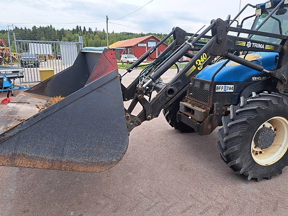 New Holland  TL 100 2 of 12