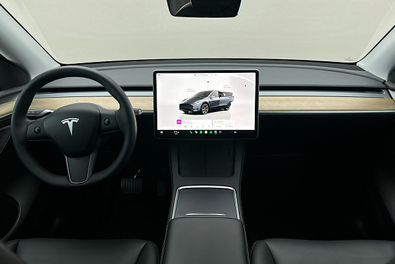 Tesla Model Y 3 of 3
