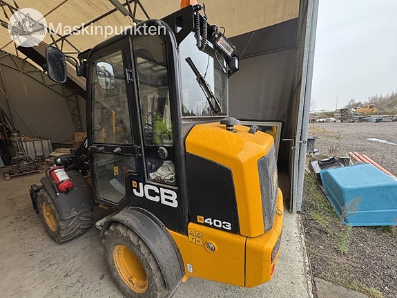 JCB 403 med redskap 2 of 27