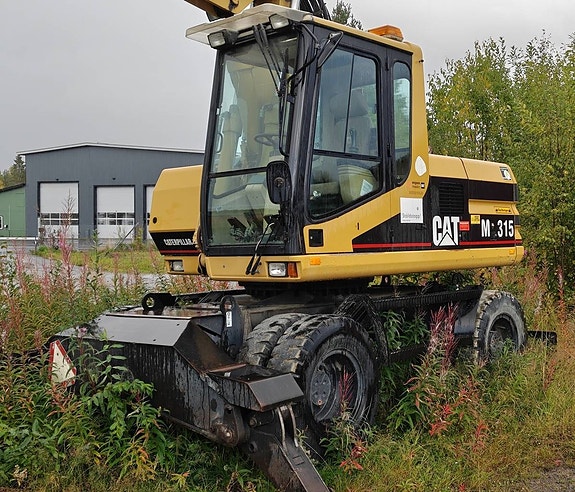 CAT M315 hjulgrävare Engcon tiltrotator Ca 10500 h Skopa 2 of 7