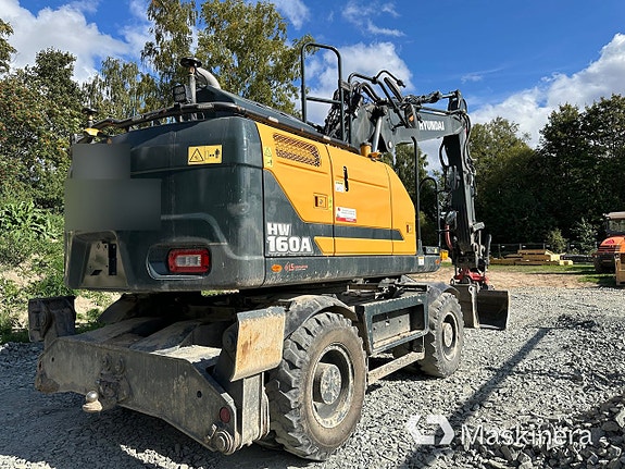 Hjulgrävare Hyundai HW160A med maskinsytrning, kärra & redskap 5 of 27