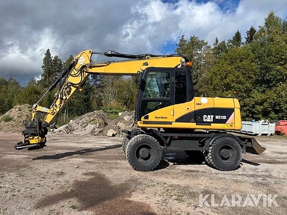 Grävmaskin Cat M313D med tiltrotator 2 of 6