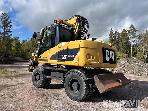 Grävmaskin Cat M313D med tiltrotator 3 of 6