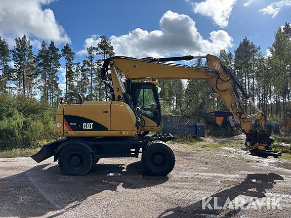 Grävmaskin Cat M313D med tiltrotator 6 of 6
