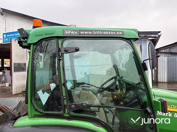 Traktor John Deere 4520 med vikplog och sandspridare 19 of 30
