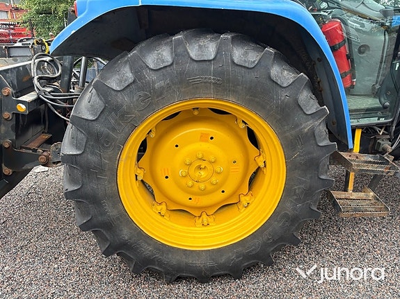 Traktor New Holland TL 90 med vikplog och sandspridare 14 of 30