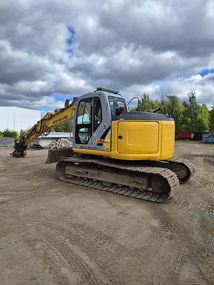 New Holland Kobelco E135 Sr Engcon m grip. 2 of 6