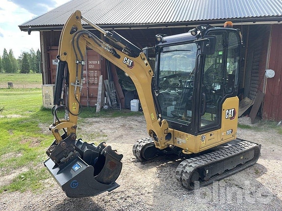 Minigrävare med redskap CAT 302 3 of 6