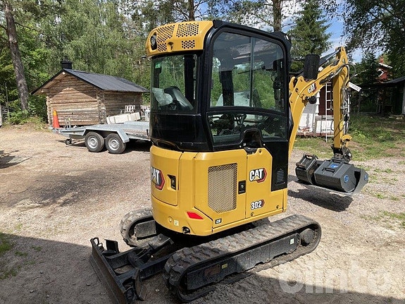 Minigrävare med redskap CAT 302 6 of 6