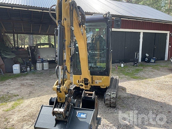 Minigrävare med redskap CAT 302 2 of 6