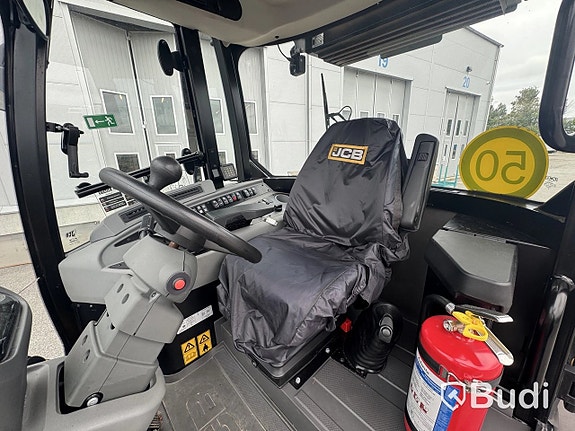 Hjullastare JCB 409 SV AG -2026 | Vikplog via auktion 9 of 27