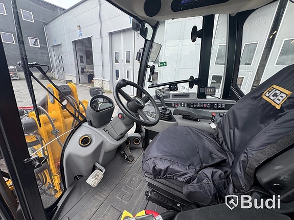 Hjullastare JCB 409 SV AG -2026 | Vikplog via auktion 10 of 27