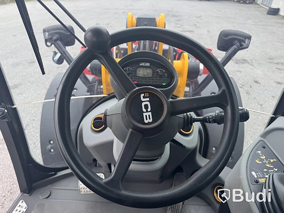 Hjullastare JCB 409 SV AG -2026 | Vikplog via auktion 11 of 27