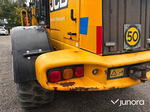 Hjullastare JCB 411 HT med vikplog 30 of 30