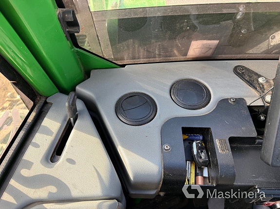 Skotare John Deere 1510G 19 of 27