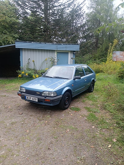 Mazda 323 4 of 11