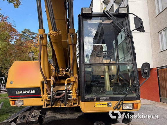 Hjulgrävare CAT 312M 12 of 27