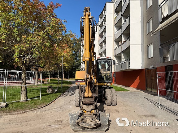 Hjulgrävare CAT 312M 2 of 27