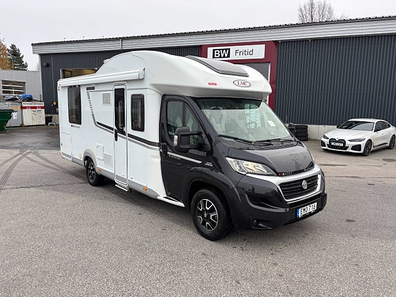 LMC Breezer H737 Blackline - Queenbed - Alde - Dragkrok 1900kg - Taksäng - 2 of 25