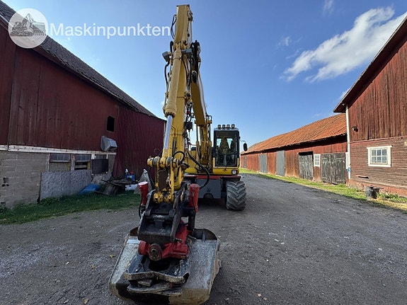 Komatsu PW140 2 of 27