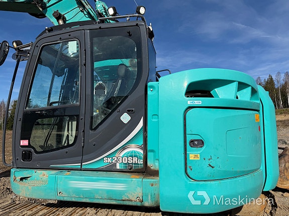 Grävmaskin Kobelco SK230SRLC-5E med skopor & pålaggregat 20 of 27