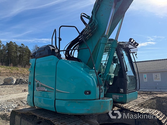 Grävmaskin Kobelco SK230SRLC-5E med skopor & pålaggregat 11 of 27