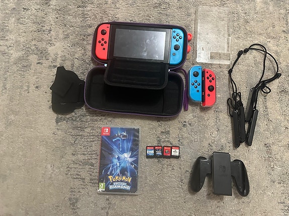 Nintendo Switch + 4 spel, extra Joy-Con & väska