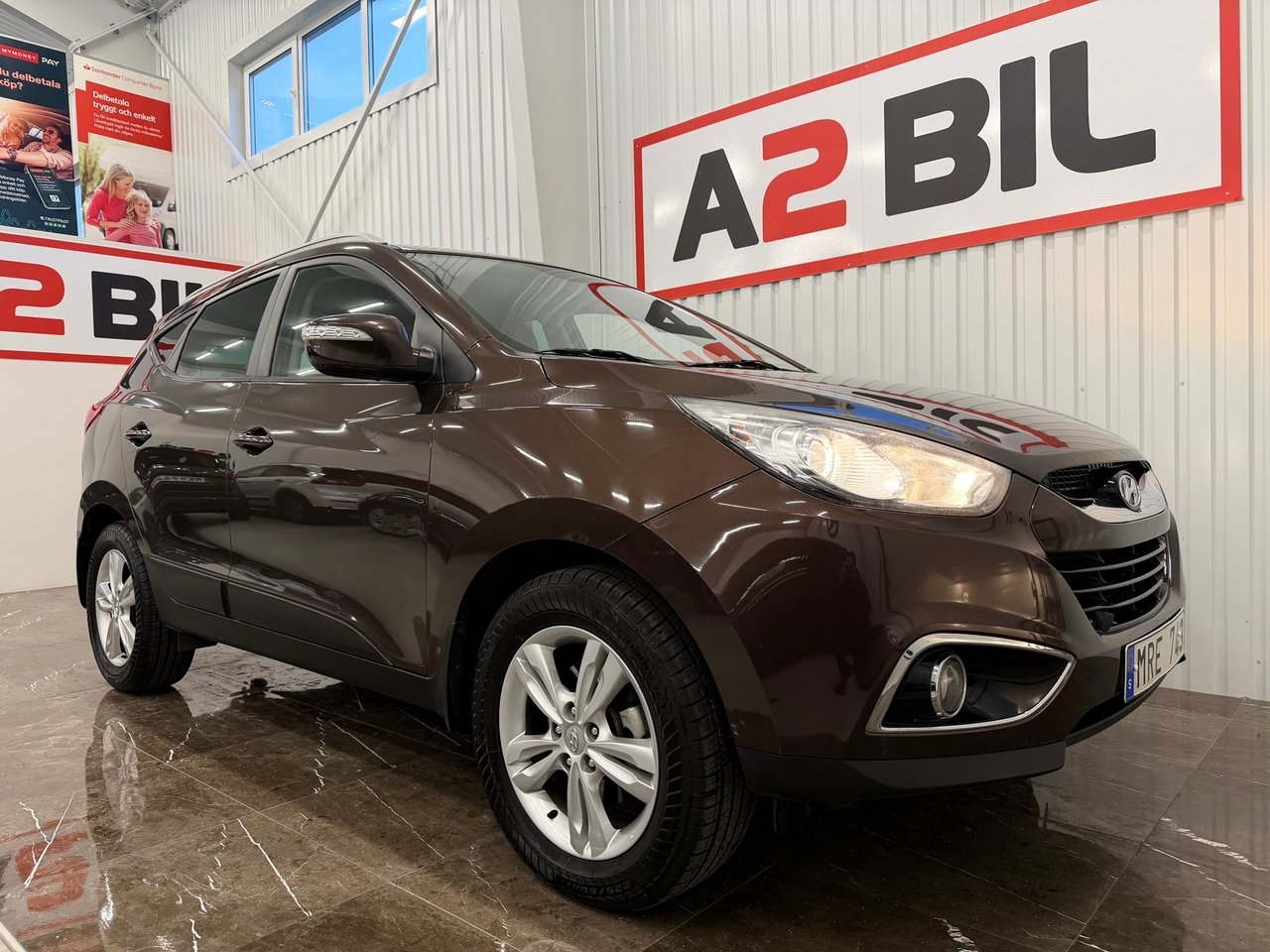 Hyundai ix35 2.0 CRDi 4WD Business Drag 2013, bild 2/23