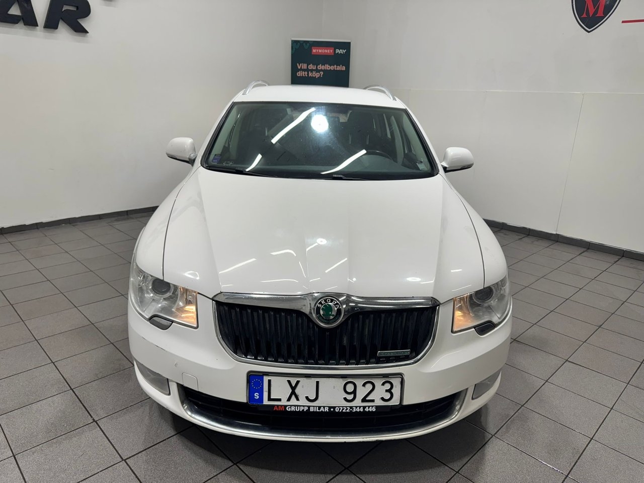 Skoda Superb 2012, photo 7/10
