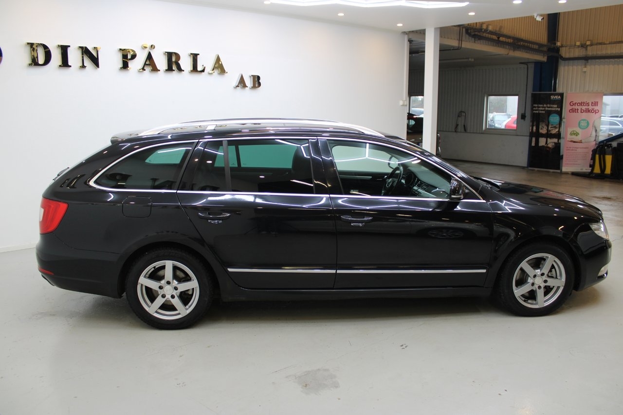 Skoda Superb 2011, bild 4/10