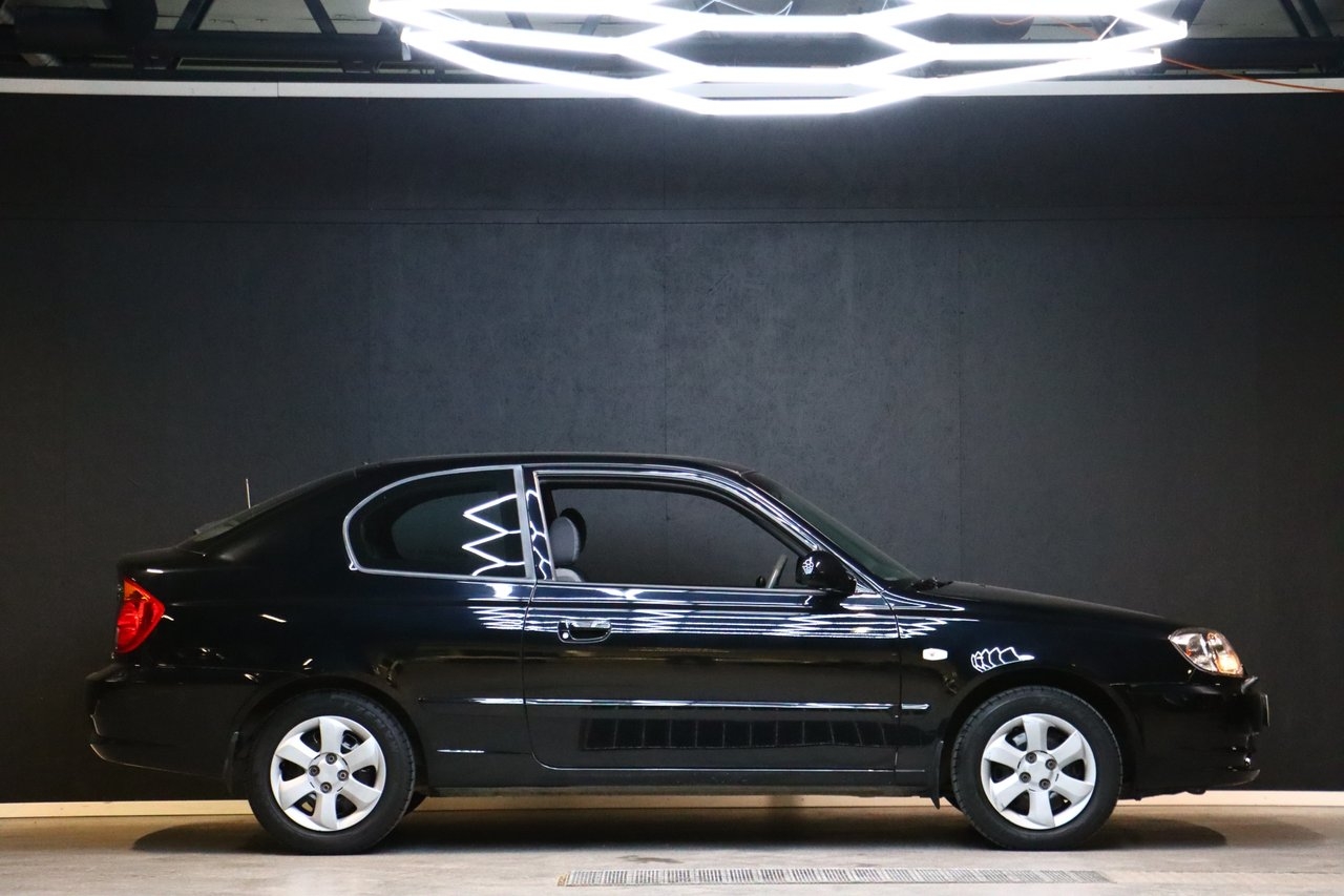 Hyundai Accent 2004, bild 7/10