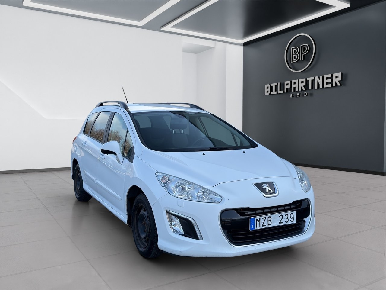 Peugeot 308 2012, bild 3/14