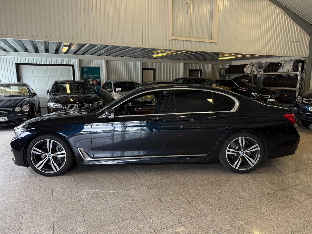 BMW 750 i xDrive M Sport 450hk B&W 2016, photo 6/20
