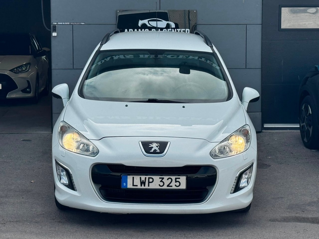 Peugeot 308 SW 1.6 e-HDi FAP 2011, bild 2/10