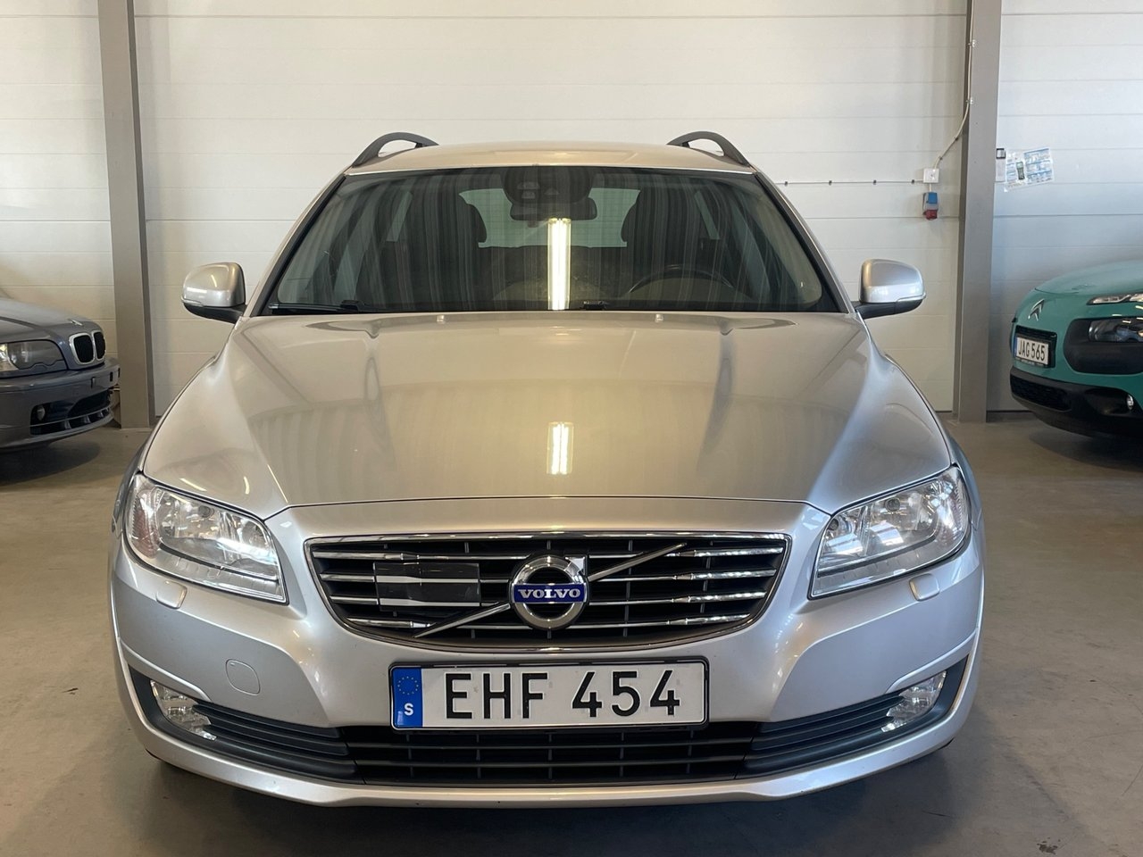 Volvo V70 2016, photo 4/24