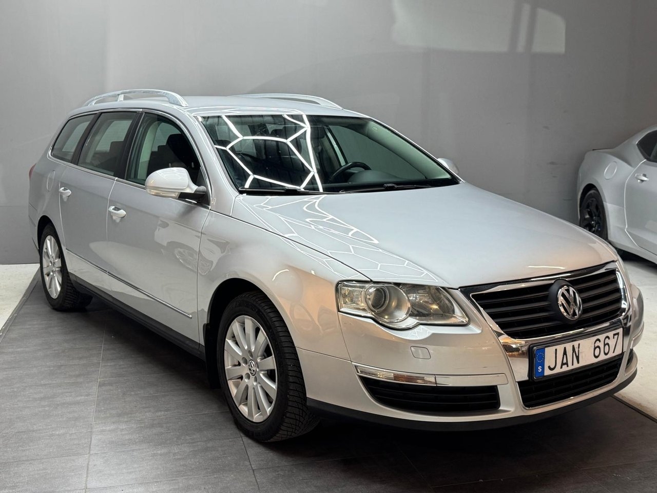 Volkswagen Passat 2010, bild 2/10