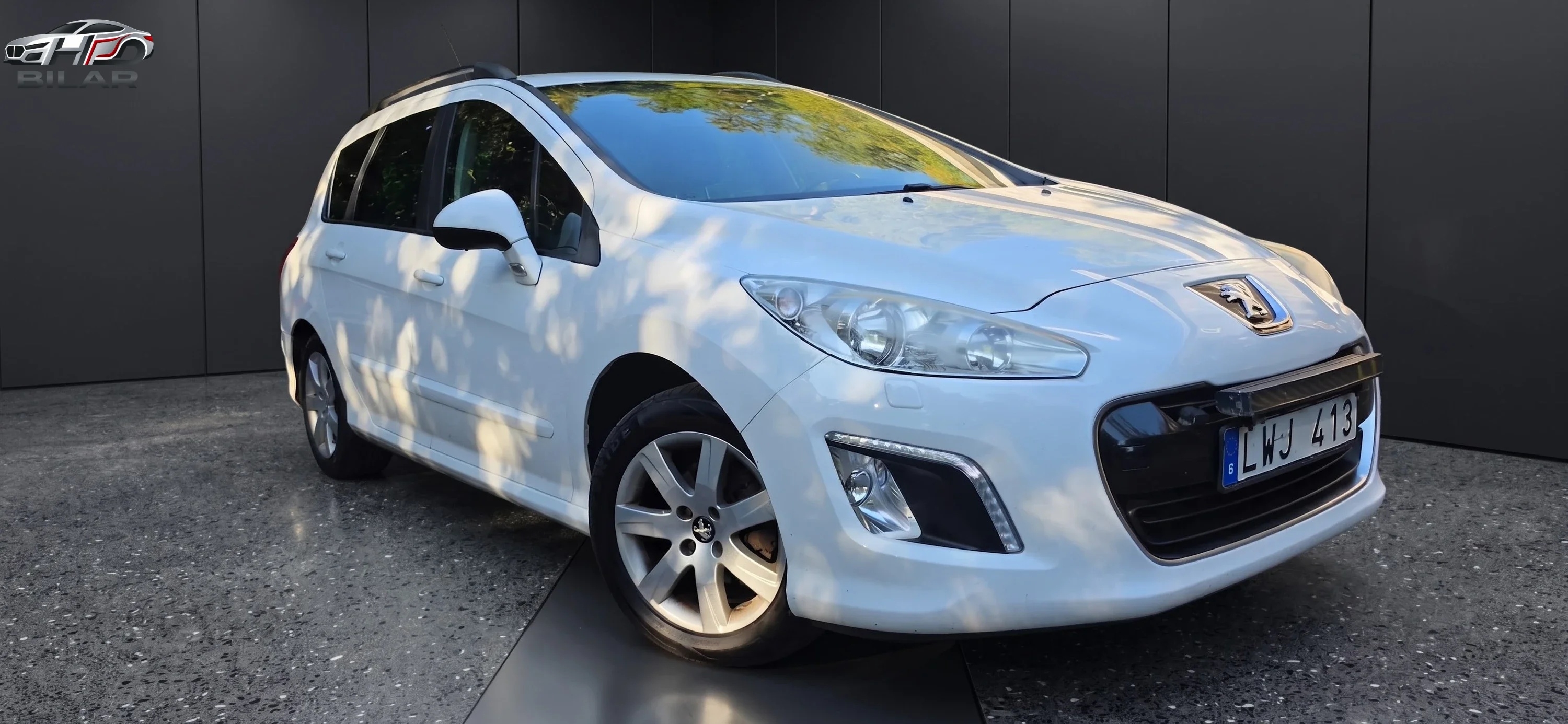 Peugeot 308 SW 1.6 e-HDi 2012, bild 2/10