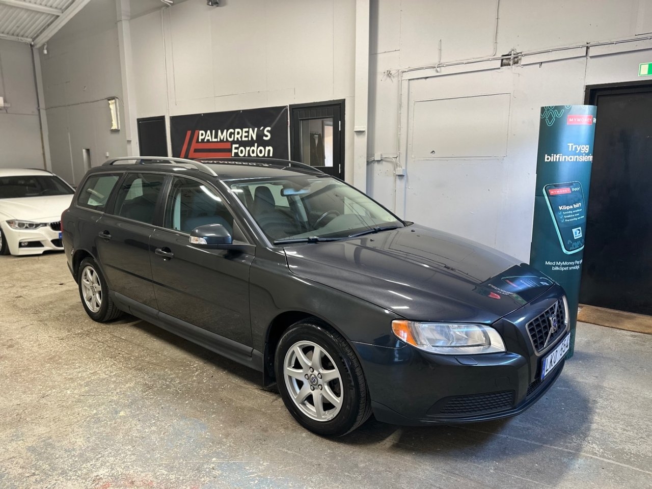 Volvo V70 2009, photo 2/10