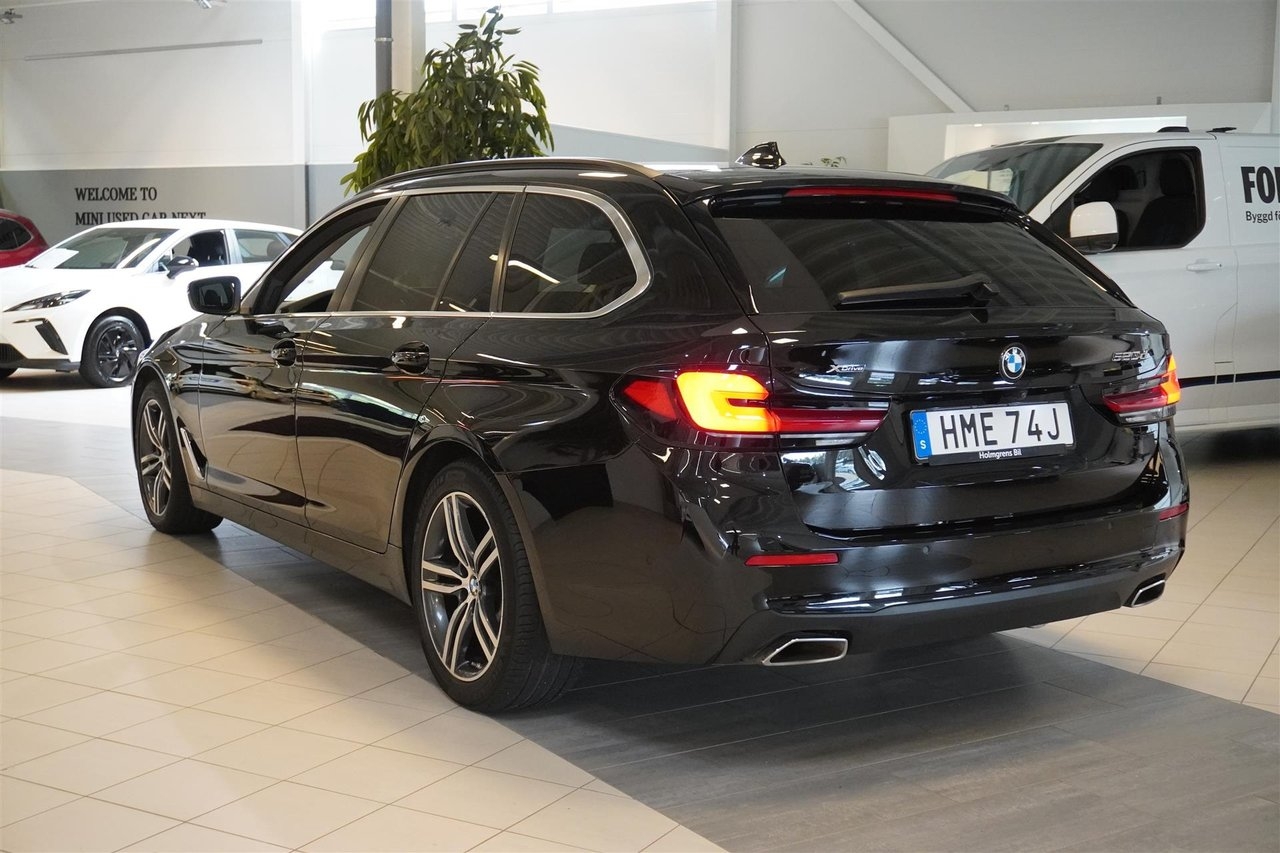 BMW 520 d xDrive Touring MHEV 2023, photo 4/24