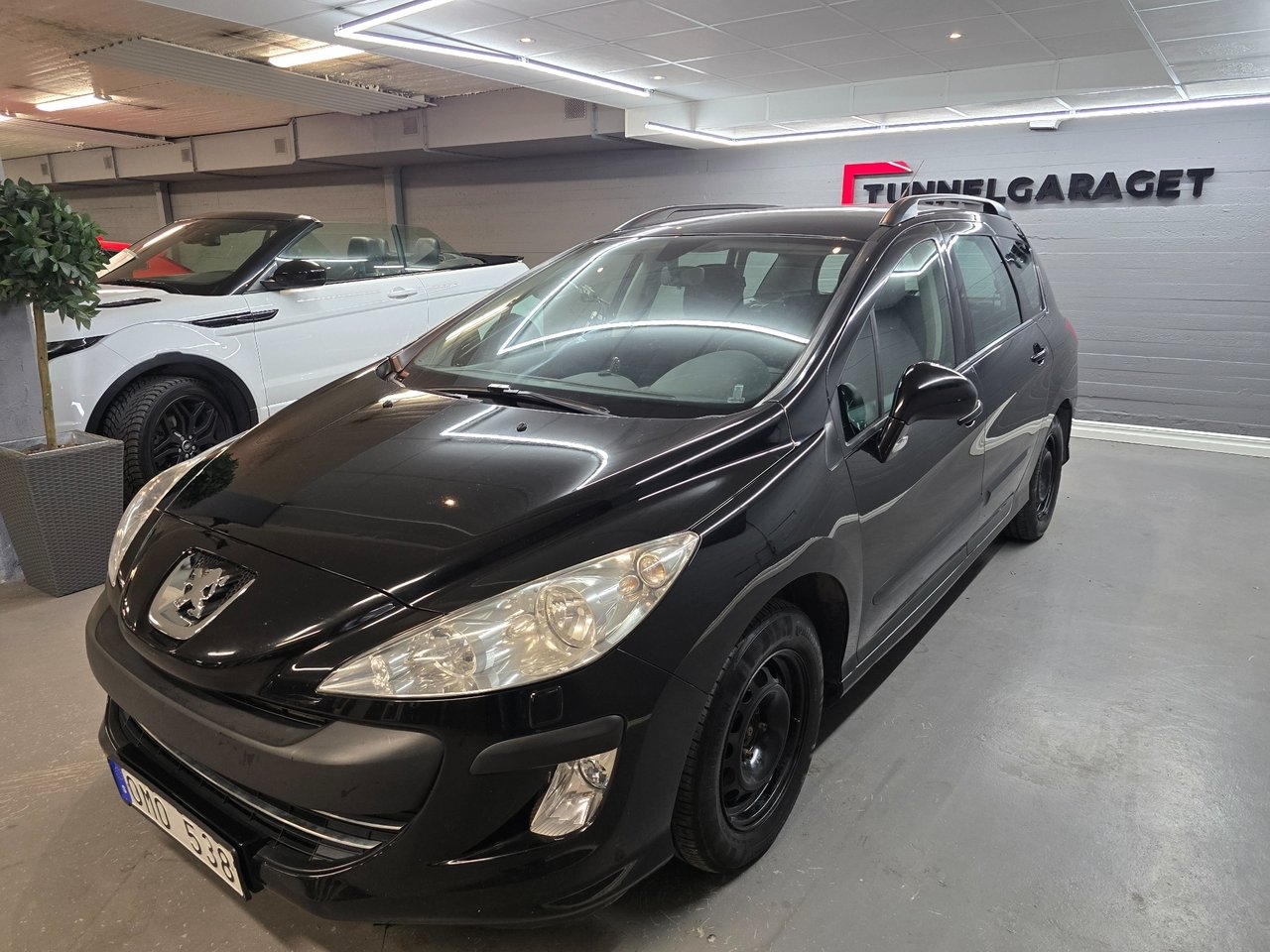 Peugeot 308 2010, bild 2/8