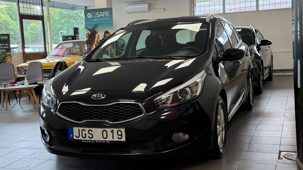 Kia Ceed cee'd_sw 1.4 CRDi EX Euro 5 2014, bild 3/10