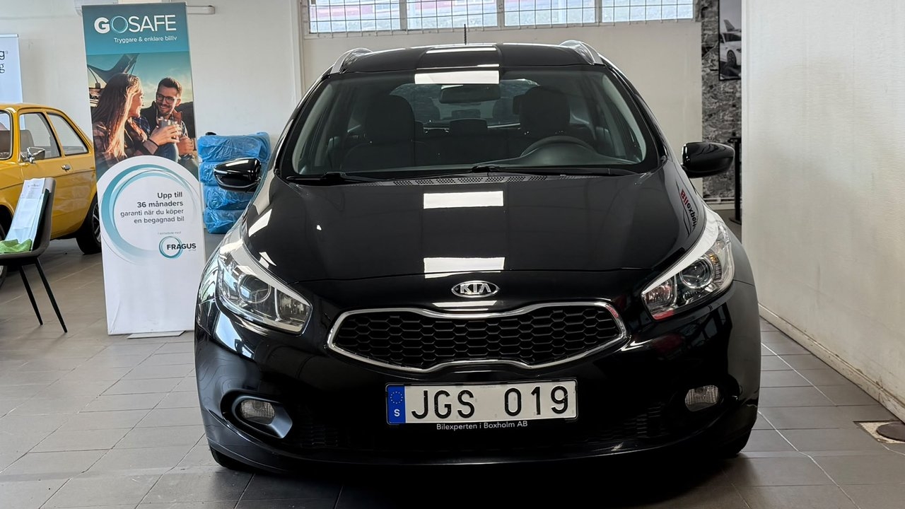 Kia Ceed cee'd_sw 1.4 CRDi EX Euro 5 2014, bild 2/10