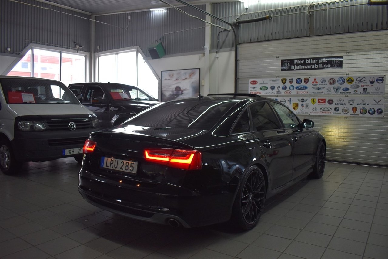 Audi A6 2011, bild 2/10