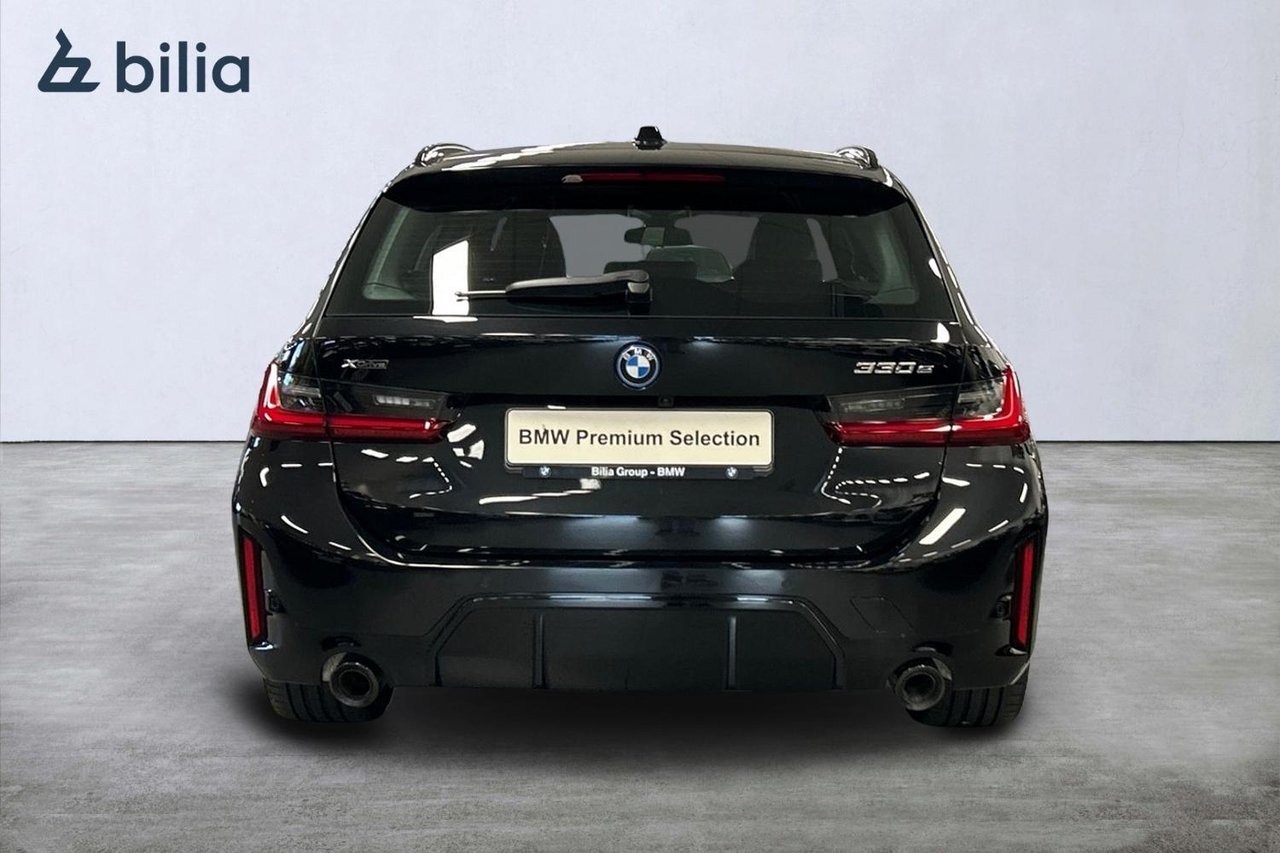 BMW 330 e xDrive Touring M-Sport 2024, photo 4/10